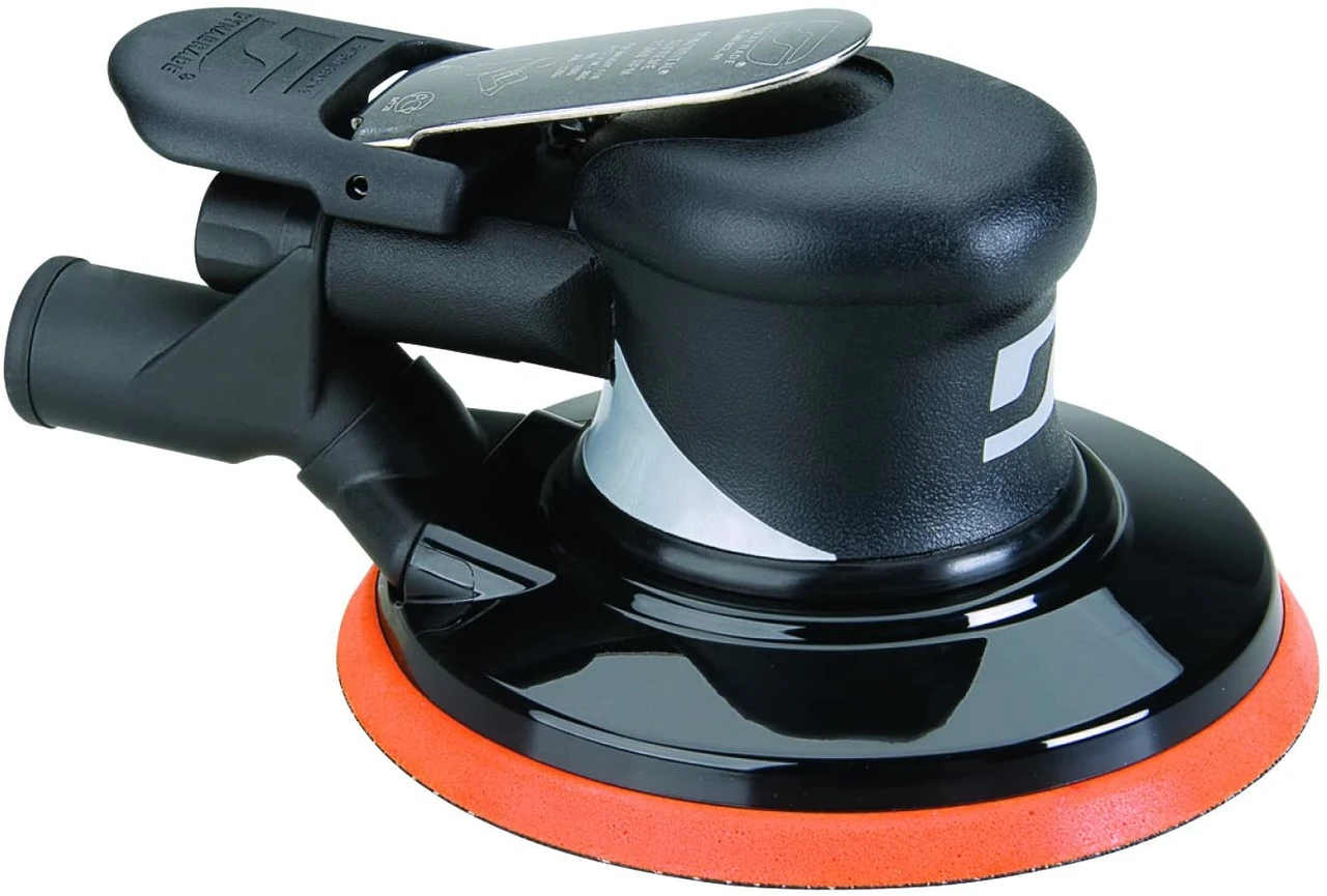 Dynabrade round-pad orbital sander with rear vacuum connection