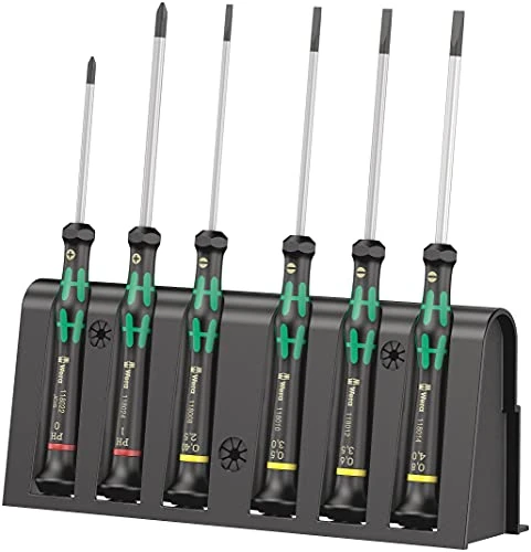 Six Wera green-black micro screwdrivers in a black rack